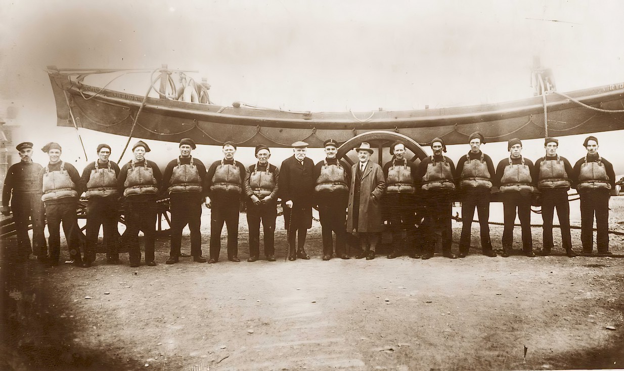 The last crew of the Ryder lined up in front of the boat