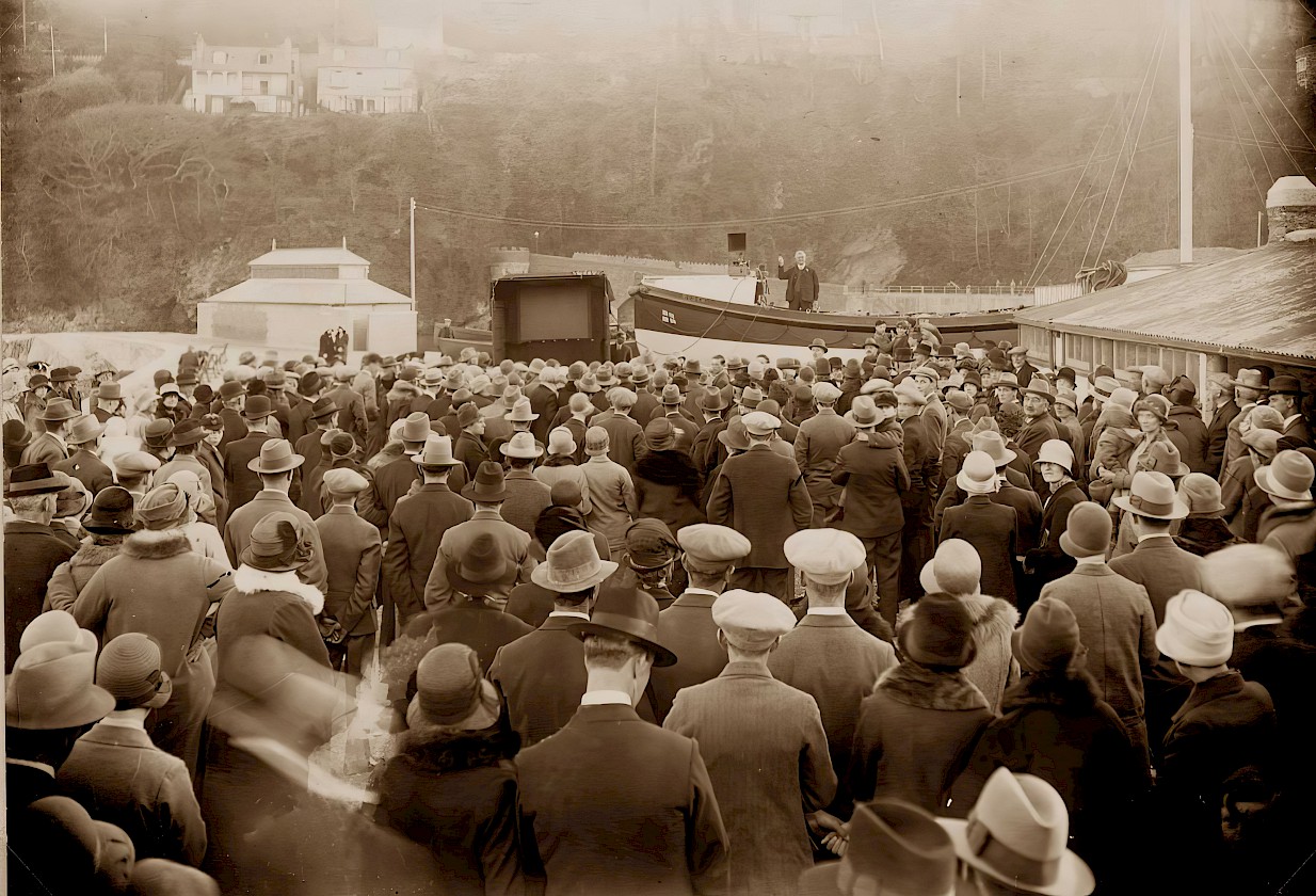 A large crowd gathers to bid farewell to Ryder